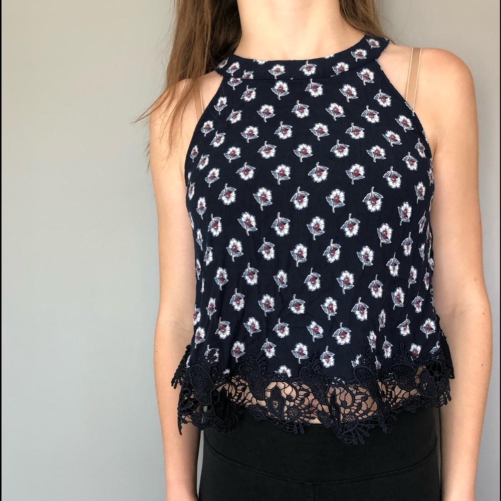 navy blue tank top with white floral pattern